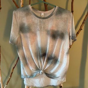 Lululemon spray camo surge athletic shirt. Size 10. New condition. $30